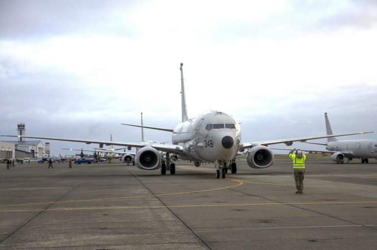 FILE - In this Oct. 23, 2019, file image provided by the U.S. Navy, a sailor assigned to the Grey Knights of Patrol Squadron (VP) 46 signals the pilot in the flight station of a P-8A Poseidon during a pre-flight check, in Oak Harbor, Wash. The same kind of plane that flew near the site of the Nord Stream pipelines in the Baltic Sea. (Austin Ingram/U.S. Navy photo by Mass Communication Specialist 2nd Class via AP, File)