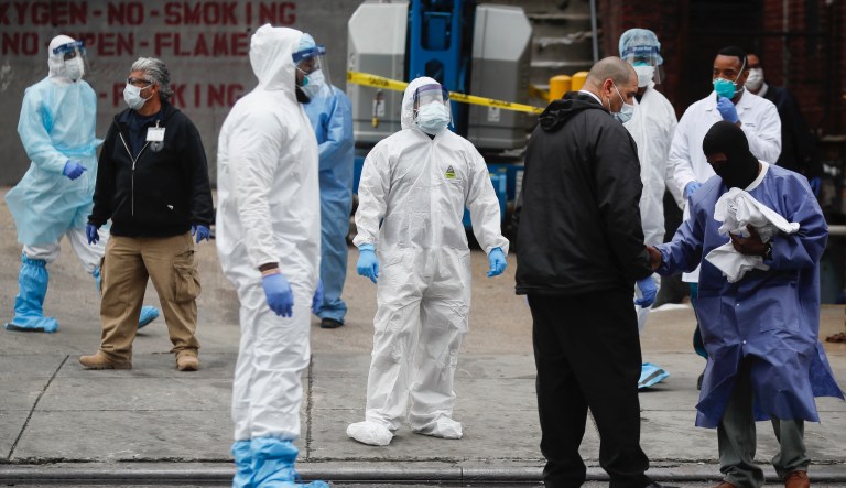 Coronavirus can spread through talking or breathing, scientists warn White House