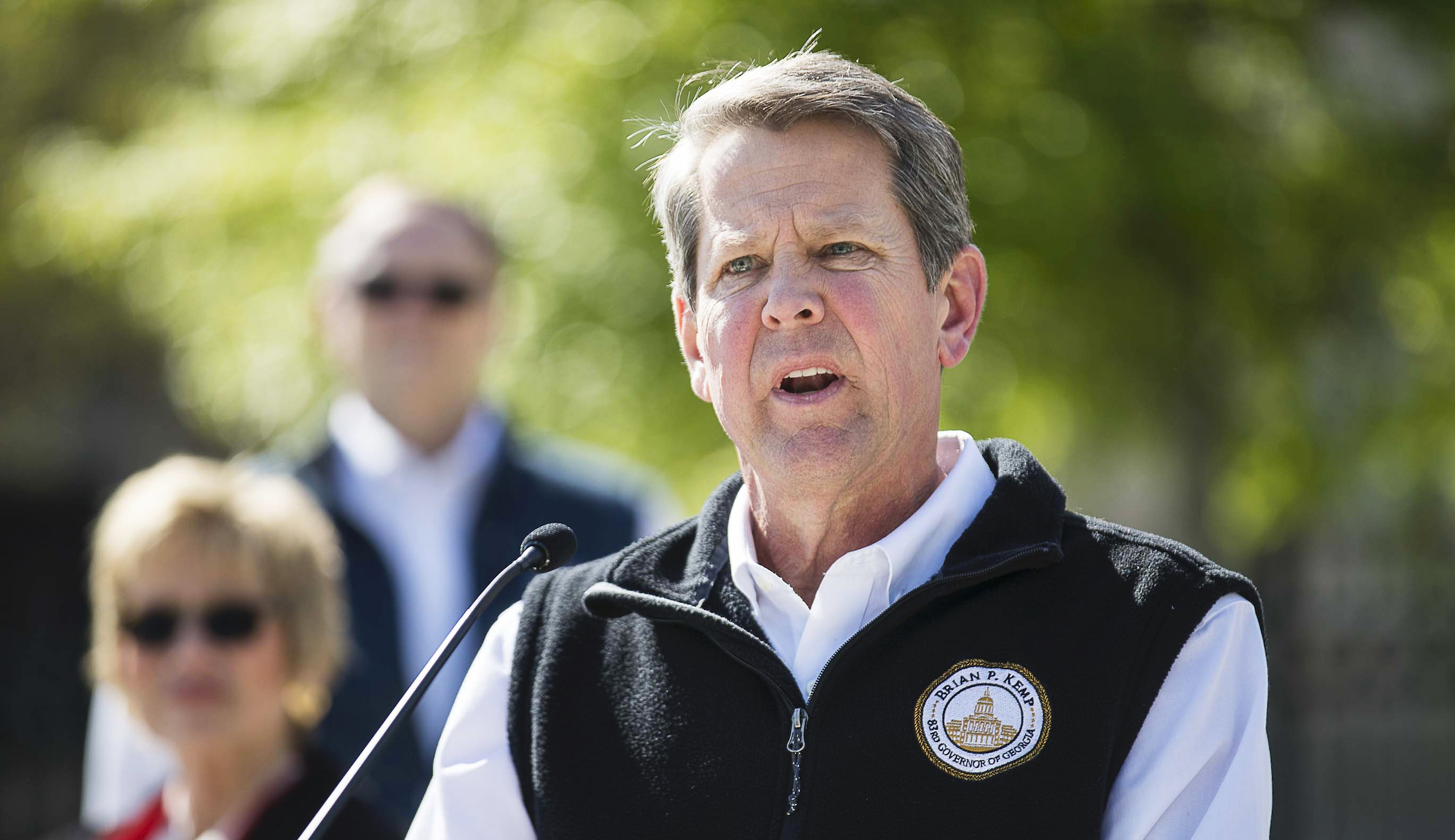 Brian Kemp signs sweeping elections bill into law