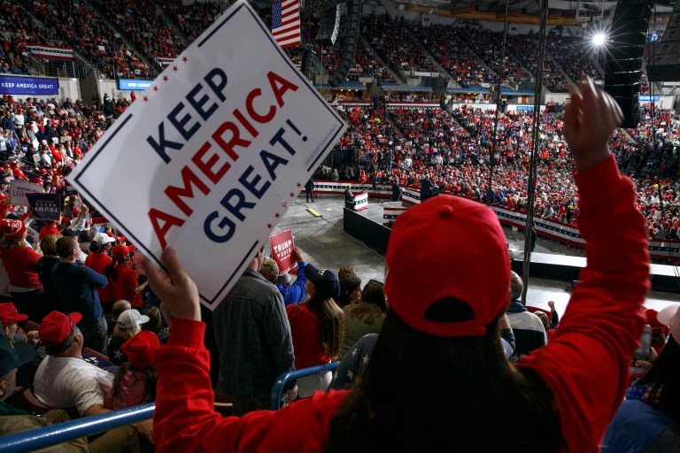 Three men throw eggs at several young children at pro-Trump rally
