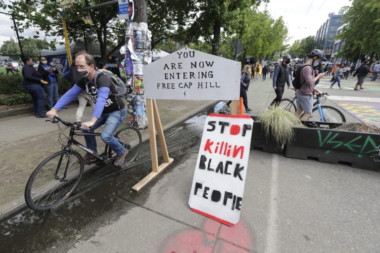 Seattle police responding cautiously to 911 calls around police-free CHOP