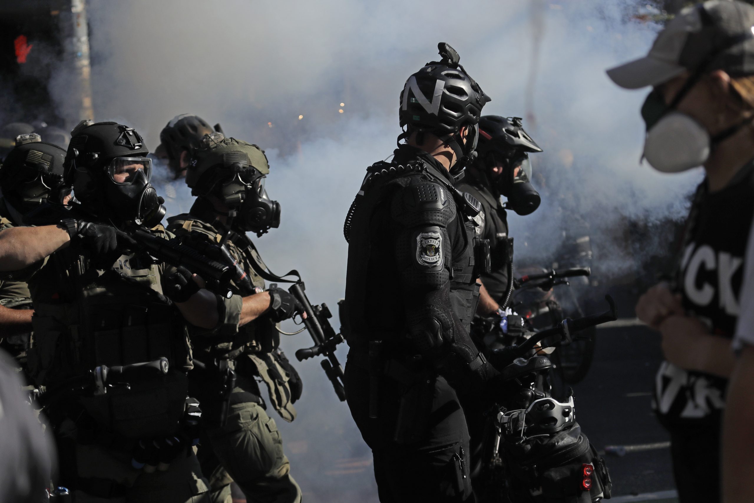 Washington activist groups want Seattle police held in contempt of court