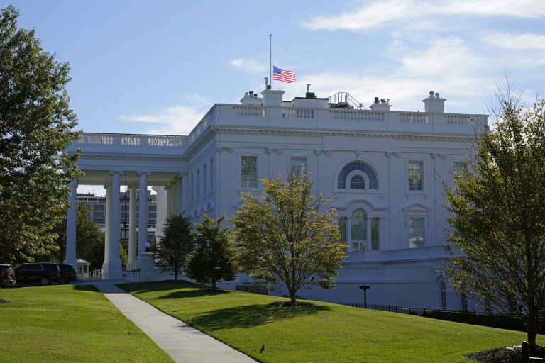 An American flag flies at half-staff over the White House in Washington, Saturday, Sept. 19, 2020, the morning after the death of Supreme Court Justice Ruth Bader Ginsburg.