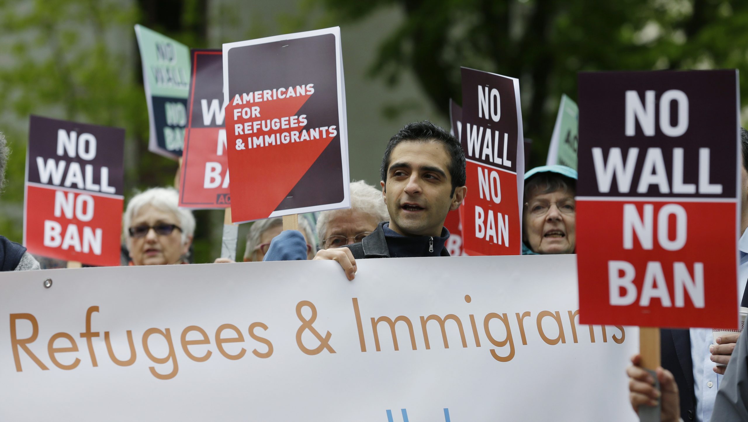 Visa applicants barred by Trump travel ban may reapply following Biden order