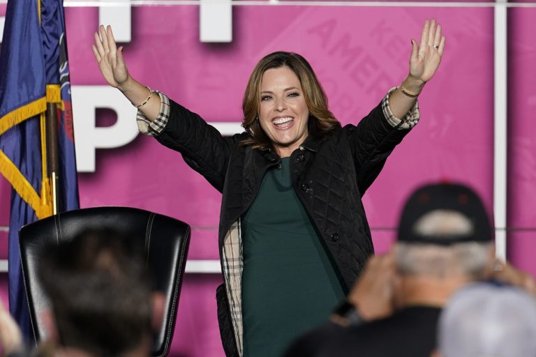 Former White House adviser Mercedes Schlapp waves as she arrives on a Women for Trump Bus Tour campaign event, Thursday, Oct. 8, 2020, in New Castle, Pa. She and her husband Matt Schlapp, head of the Conservative Political Action Conference, are teaming up for a CPAC podcast three times a week.