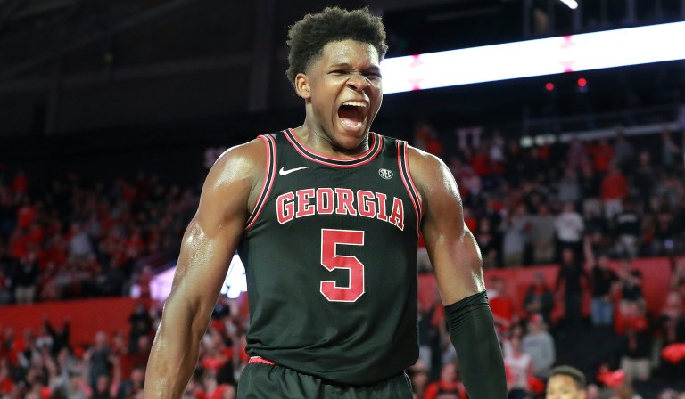 Feb. 1, 2020 Athens: Georgia guard Anthony Edwards reacts to his break away slam dunk after making a steal with Texas A&M guard Wendell Mitchell looking on in the final minutes of a 63-48 Georgia victory in a NCAA college basketball game on Saturday, Feb. 1, 2020, in Athens.  