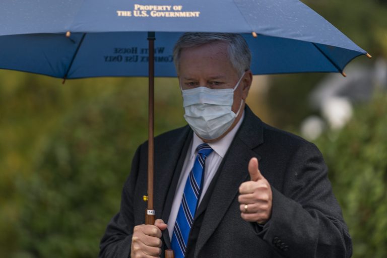 White House chief of staff Mark Meadows gestures as he responds to reporters questions outside the West Wing on the North Lawn of the White House, Sunday, Oct. 25, 2020, in Washington.