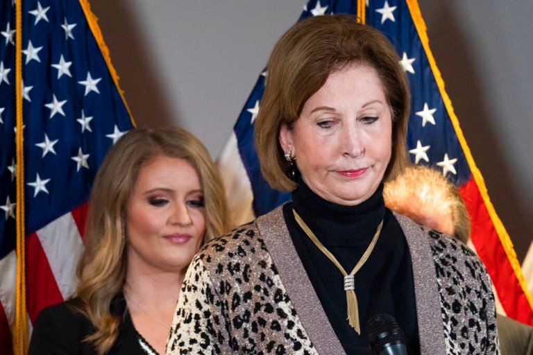 Members of President Donald Trump's legal team, Sidney Powell, right, with Jenna Ellis, left, attend a news conference at the Republican National Committee headquarters, Thursday Nov. 19, 2020, in Washington.