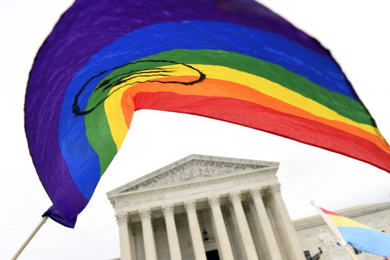 People gather outside the Supreme Court in Washington.