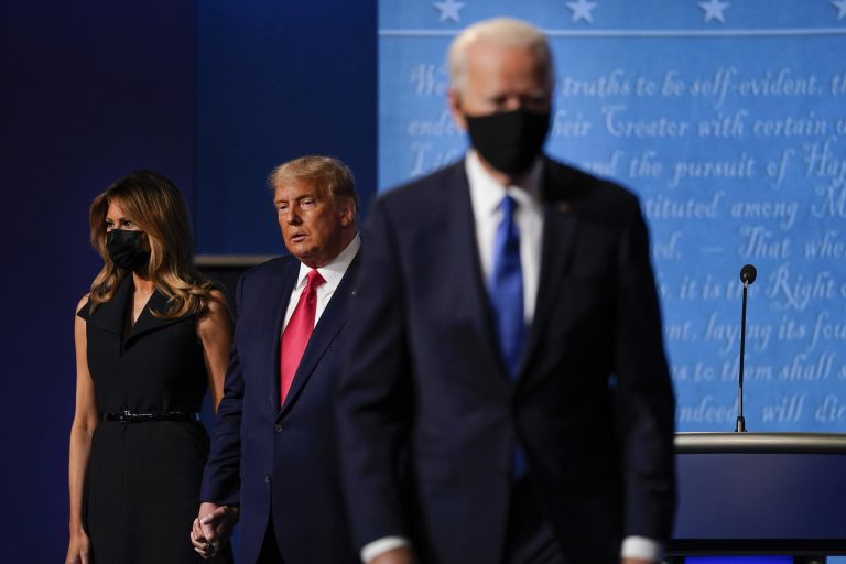 Former first lady Melania Trump and former President Donald Trump remain on stage as Joe Biden leaves the final presidential debate at Belmont University in Nashville, Tenn. in October.