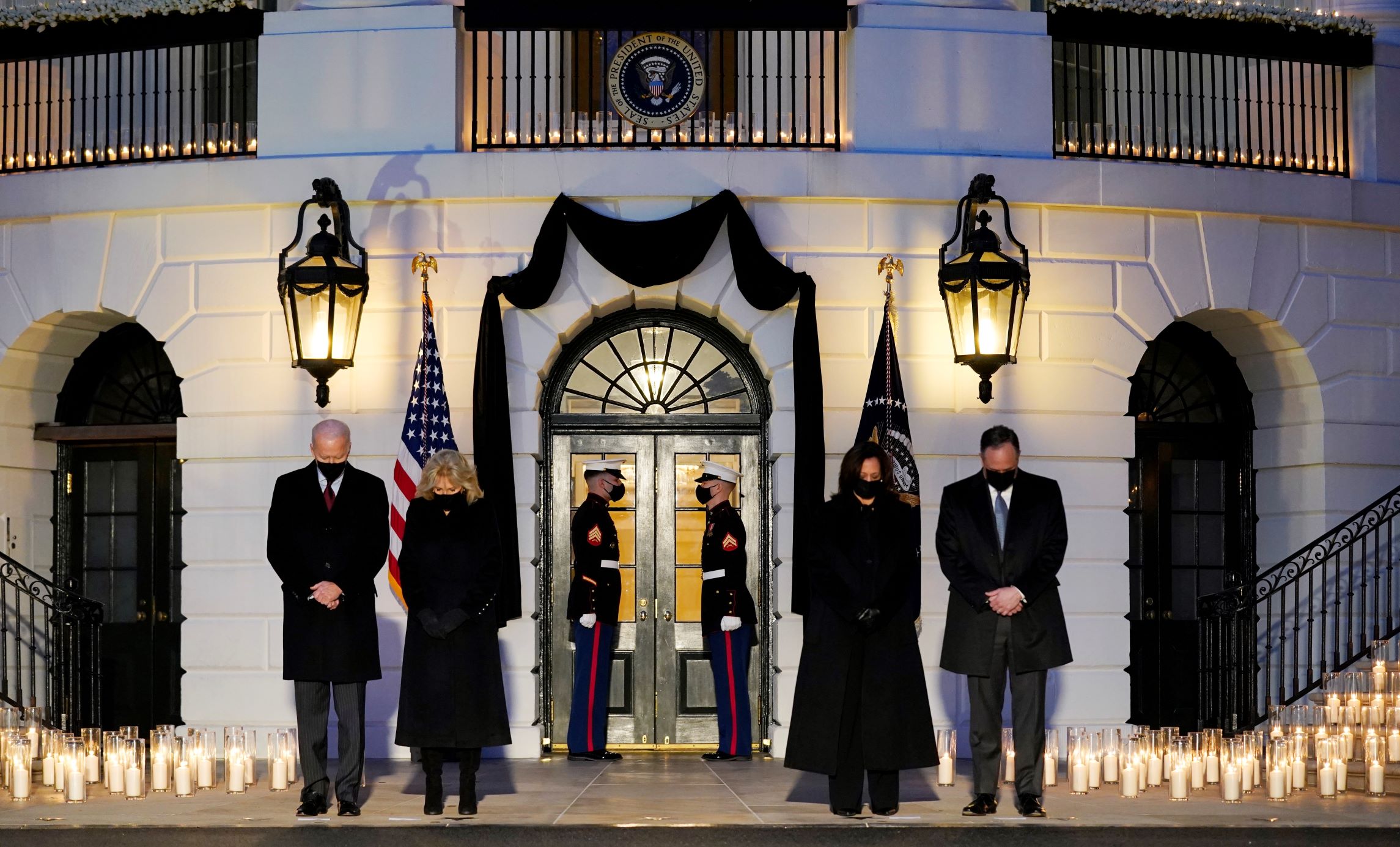 Biden holds moment of silence as US coronavirus death toll passes 500,000