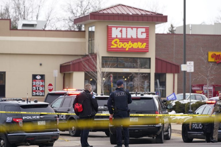 Police stand outside the King Soopers grocery store in Boulder, Colorado.