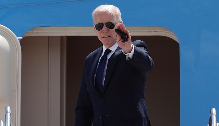 President Joe Biden waves from the stairs of Air Force One at Andrews Air Force Base, Md., Tuesday, June 1, 2021.