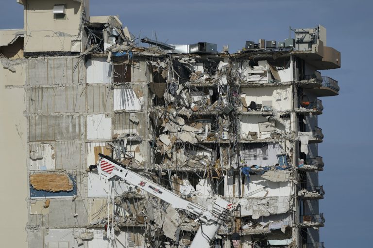 Video taken moments before Miami condominium collapse shows water leak and rubble in parking garage