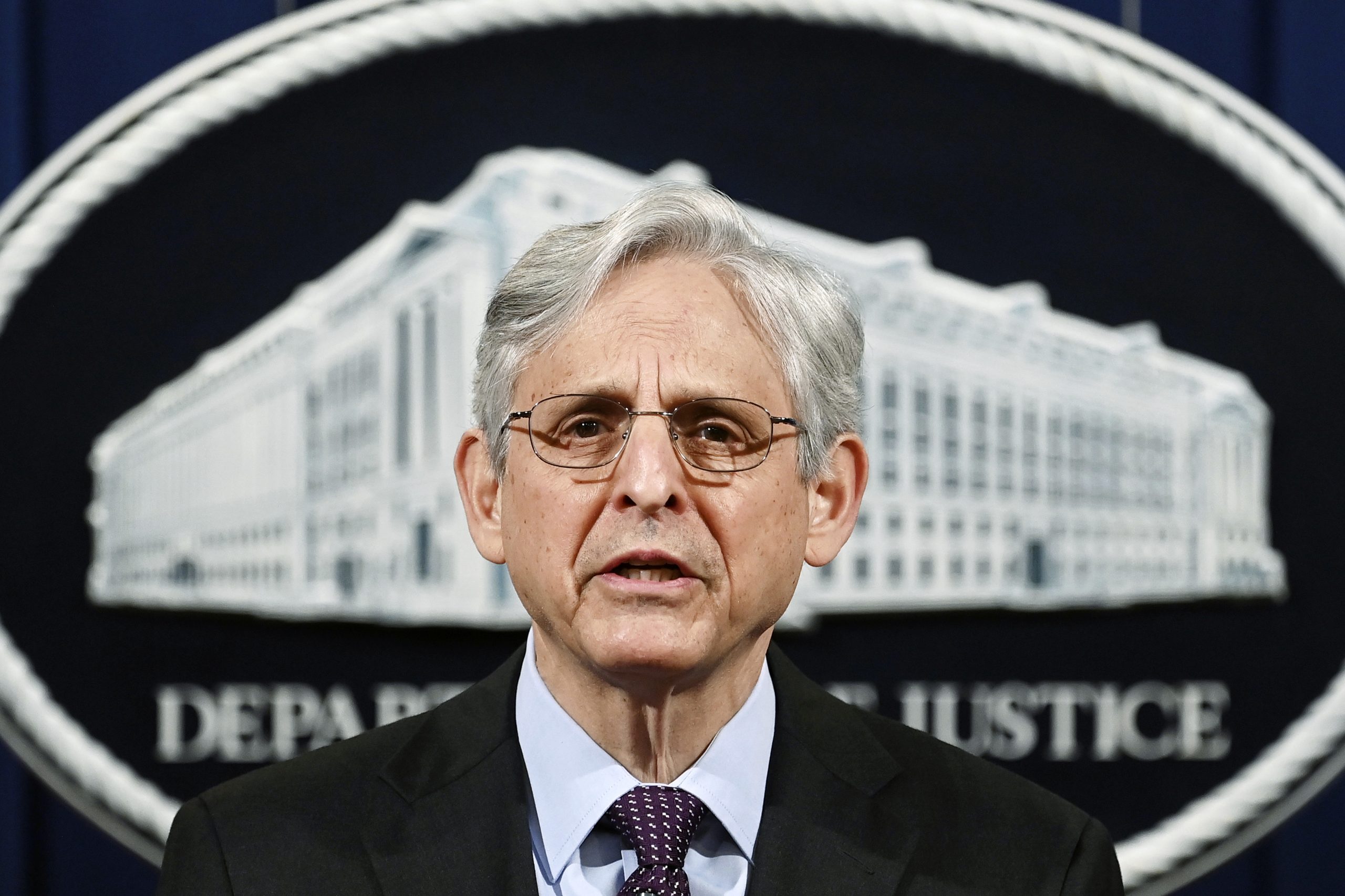 Justice Department escalates warning to states over GOP voting laws and election audits