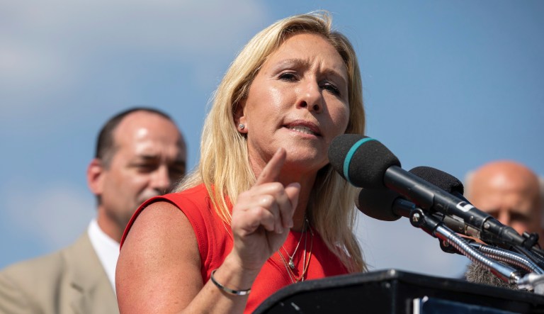 Rep. Marjorie Taylor Greene, R-Ga., discusses the infrastructure bill making its way through congress during a news conference held by the House Freedom Caucus on Capitol Hill in Washington, Monday, Aug. 23, 2021.