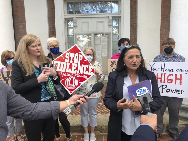 Loudoun County Commonwealth's Attorney Buta Biberaj, right, speaks Thursday, Sept. 23, 2021, in Leesburg, Va., about her concerns over the contempt-of-court citation issued by Circuit Judge James Fisher against a prosecution witness after the judge determined she was intoxicated on the stand while she testified in a trial against her alleged abuser. Critics of the judge say his actions will deter victims from coming forward.
