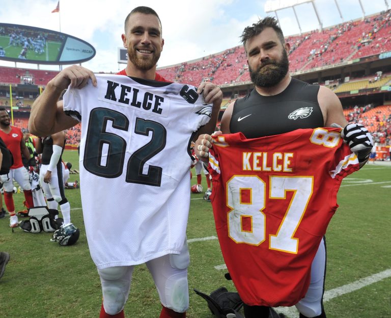 Kansas City Chiefs tight end Travis Kelce, left, and his brother, Philadelphia Eagles center Jason Kelce (62), exchange jerseys following an NFL football game in Kansas City, Mo., in this Sunday, Sept. 17, 2017, file photo.