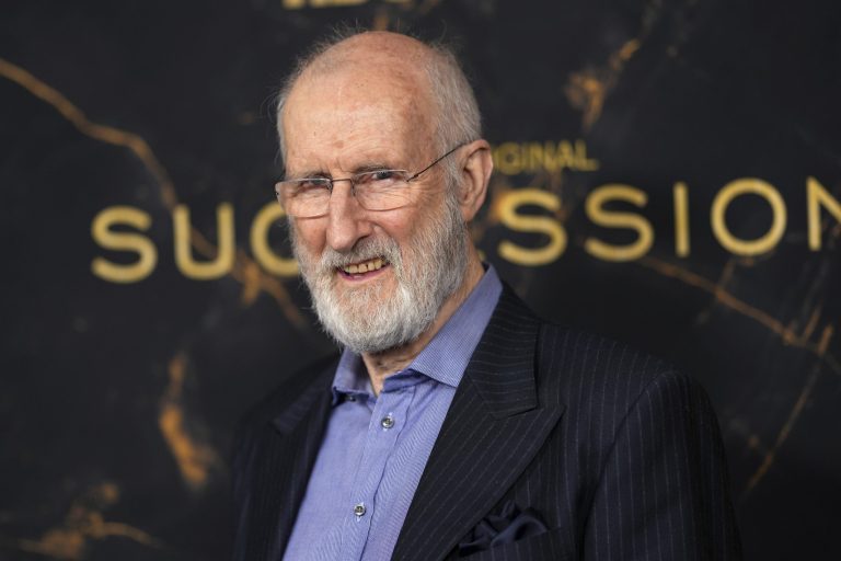 Sticky situation: James Cromwell glues himself to Starbucks counter in PETA protest