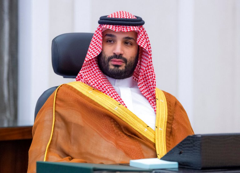In this photo released by Saudi Royal Palace, Saudi Crown Prince Mohammed bin Salman, attends the G20 Leaders' Summit via videoconference at the royal palace in Riyadh, Saudi Arabia, Saturday, Oct. 30, 2021. 