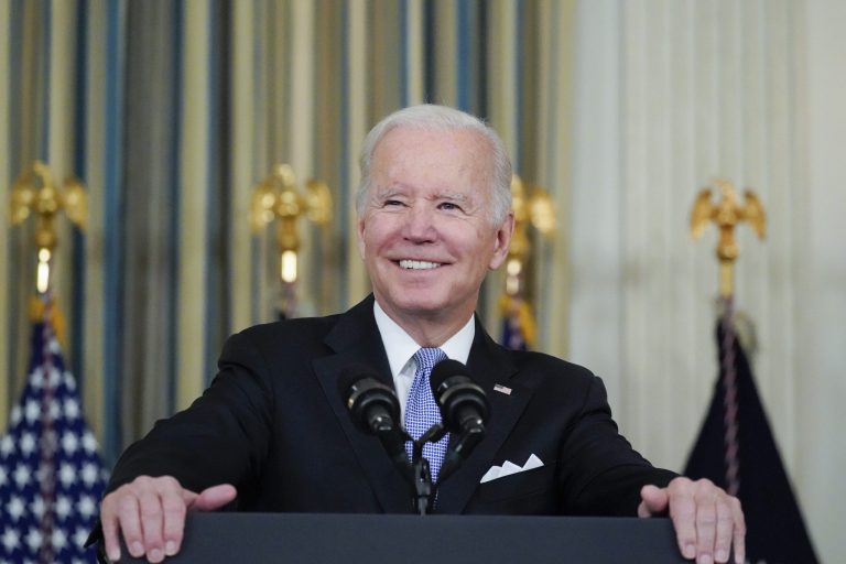 Biden digs at Trump while crowing about infrastructure and social spending bills