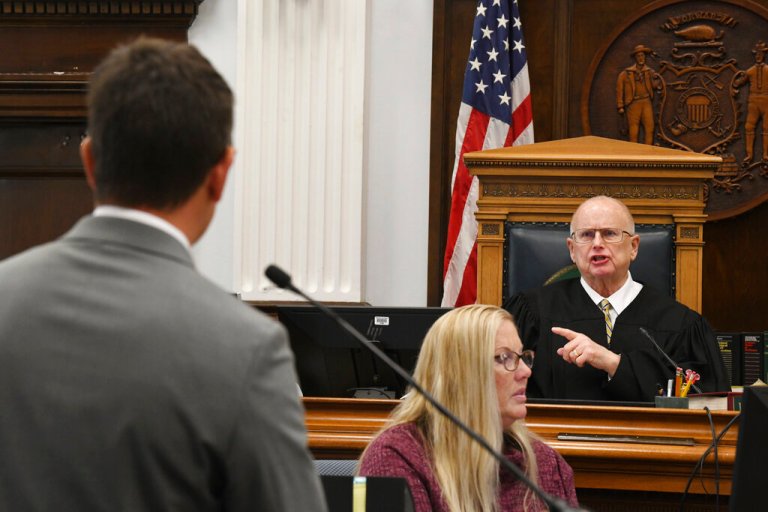 Assistant District Attorney Thomas Binger is admonished by Circuit Court Judge Bruce Schroeder during Kyle Rittenhouse's trial at the Kenosha County Courthouse in Kenosha, Wisconsin, on Wednesday.