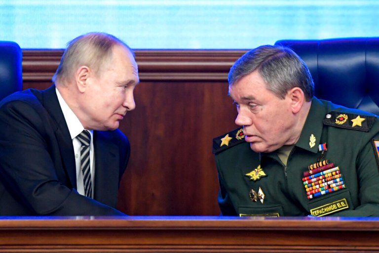 Russian President Vladimir Putin and Russian General Staff Valery Gerasimov in Moscow, Russia, Tuesday, Dec. 21, 2021.