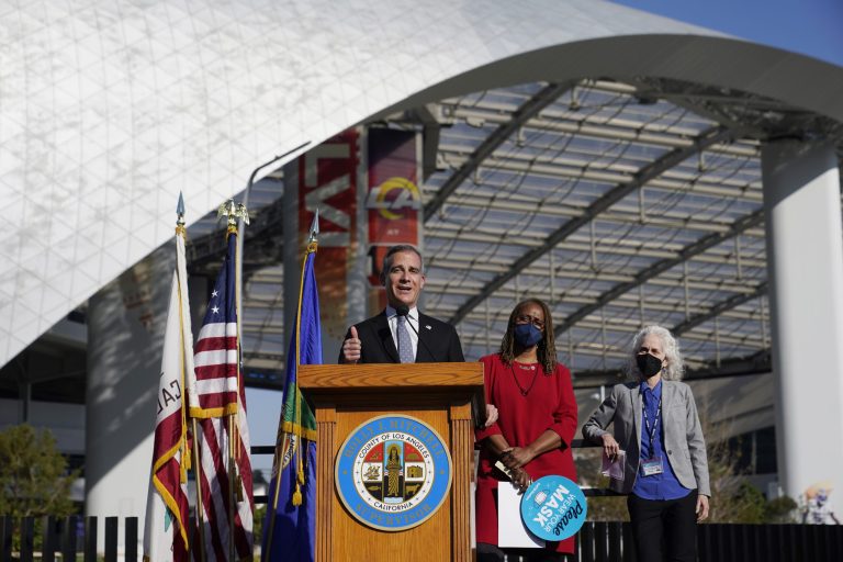 LA Mayor Eric Garcetti offers breathless defense of maskless photo with Magic Johnson