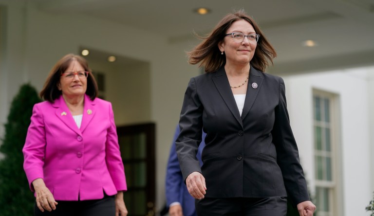 Rep. Suzan DelBene, D-Wash., chair of the New Democrat Coalition, walks out of the West Wing of the White House to speak with members of the press after meeting with President Joe Biden to discuss his domestic agenda, Wednesday, March 30, 2022, in Washington. Walking behind DelBene is Rep. Ann Kuster, D-N.H.