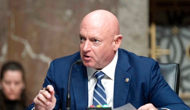 FILE - Sen. Mark Kelly, D-Ariz., speaks during a hearing of the Senate Armed Services Committee to on Capitol Hill, in Washington on March 24, 2022.