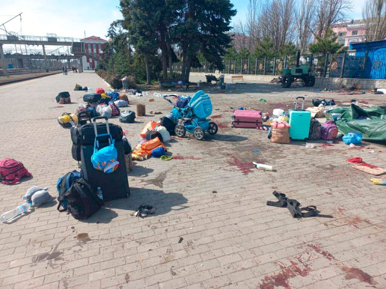 Blood stains are seen among bags and a baby carriage on a platform after Russian shelling at the railway station in Kramatorsk, Ukraine.