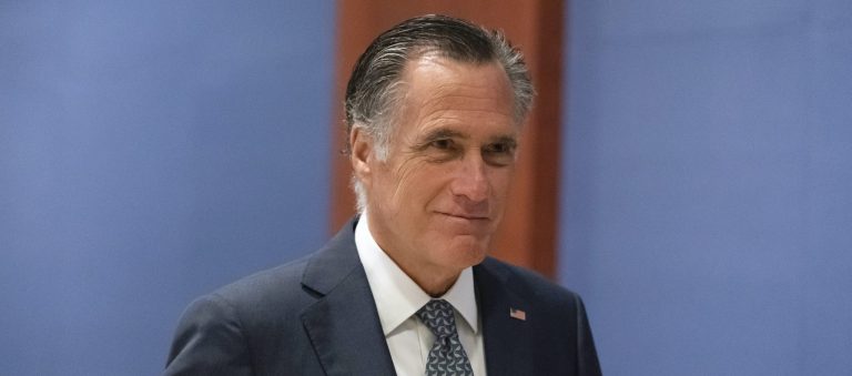 Sen. Mitt Romney, R-Utah, arrives to watch a speech by Ukrainian President Volodymyr Zelensky live-streamed into the U.S. Capitol, in Washington, Wednesday, March 16, 2022. 