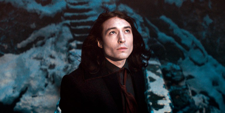 This image released by Warner Bros. Pictures shows Ezra Miller in a scene from 