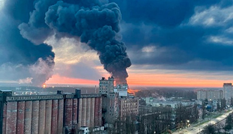 In this photo taken by an anonymous source, smoke rises from oil storage facilities hit by fire in Bryansk, Russia, Monday, April 25, 2022. The Emergencies Ministry said the massive fire at the depot in the city of Bryansk erupted overnight. The oil depot is owned by Transneft-Druzhba, a subsidiary of the Russian state-controlled company Transneft that operates the western-bound Druzhba (Friendship) pipeline carrying crude to Europe, and it wasn't immediately clear if the blaze could affect the deliveries. 