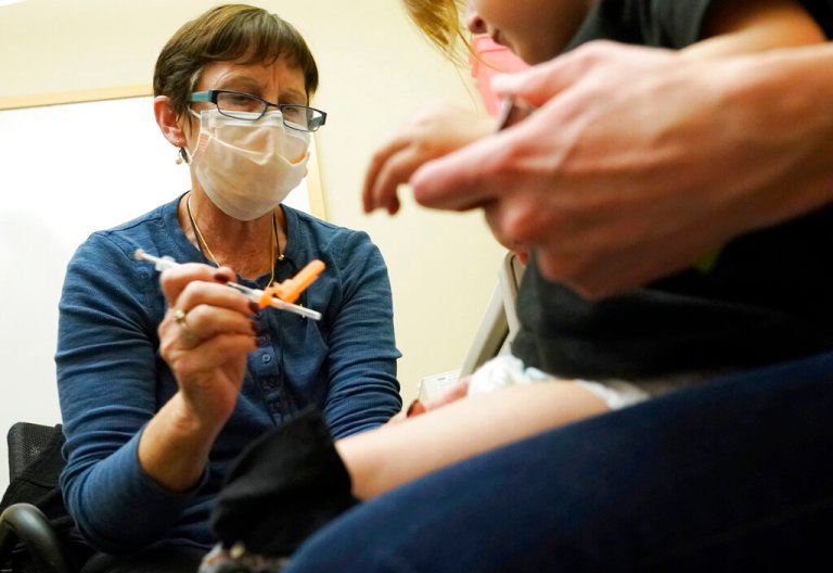 CDC advisory group votes to add COVID-19 shot to child vaccination schedule