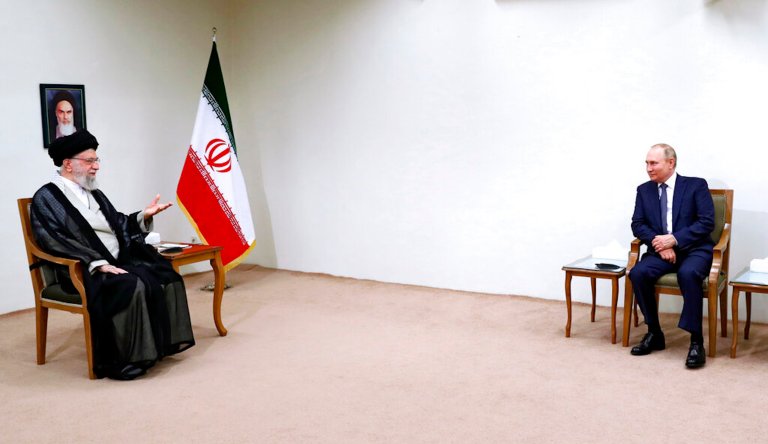 In this picture released by an official website of the office of the Iranian supreme leader, Supreme Leader Ayatollah Ali Khamenei, left, speaks with Russian President Vladimir Putin during their meeting in Tehran, Iran, Tuesday, July 19, 2022.