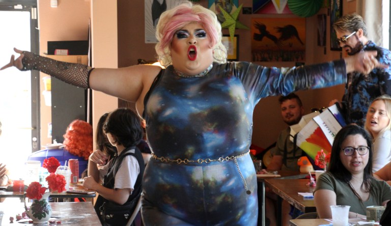 This July 28, 2022, photo shows drag queen Dela Rosa performing in a mock election at Cafecito Bonito in Anchorage, Alaska, where people ranked the performances by drag performers. 