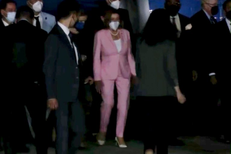 Speaker Nancy Pelosi arrives at Songshan Airport on Tuesday.