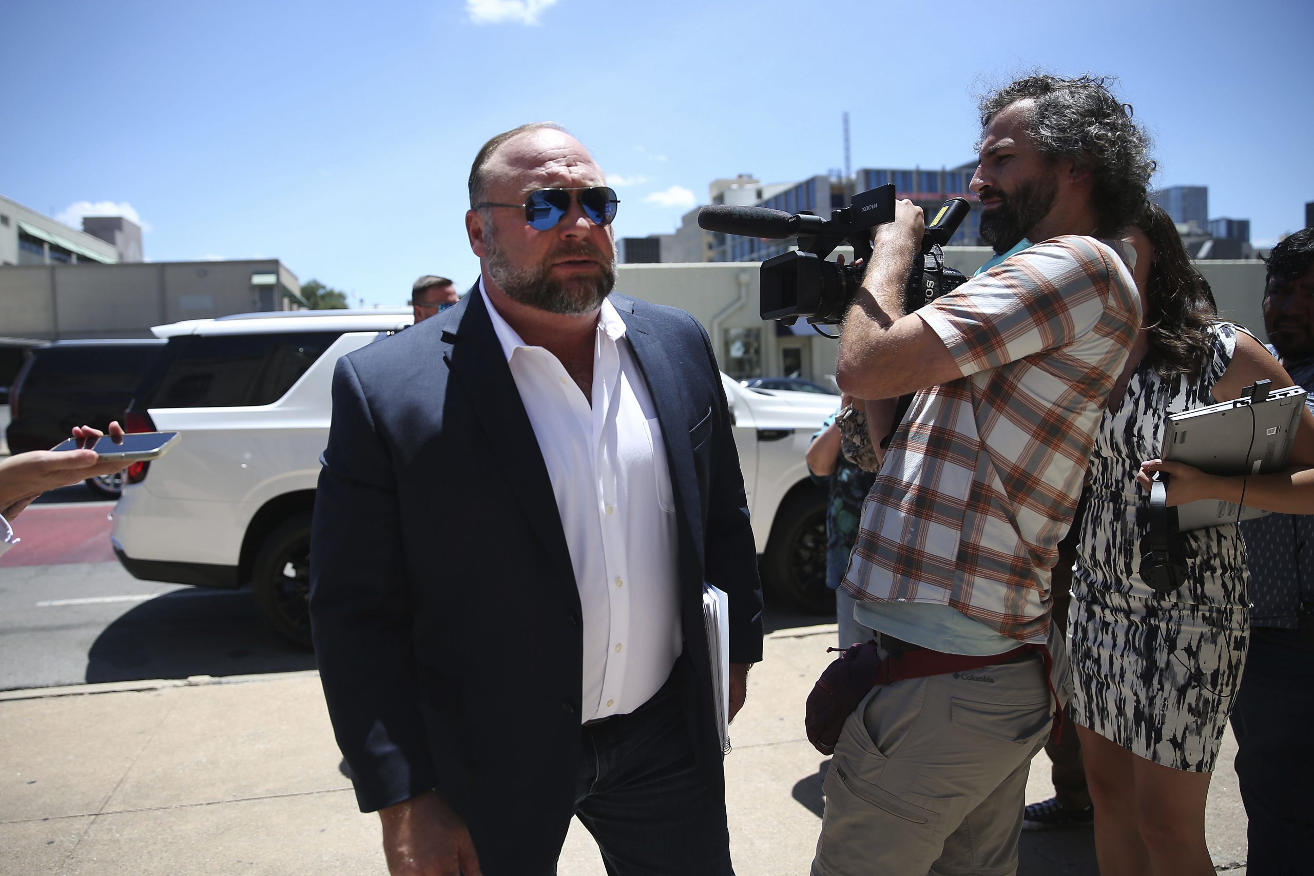 Alex Jones’s lawyers accidentally gave Sandy Hook lawyer copy of his phone