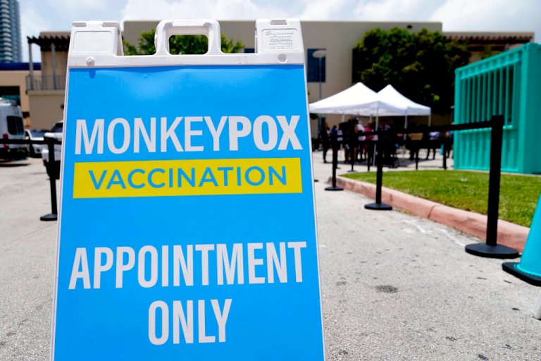 A sign for monkeypox vaccinations is shown at a vaccination site, Wednesday, Aug. 10, 2022, in Miami Beach, Fla.