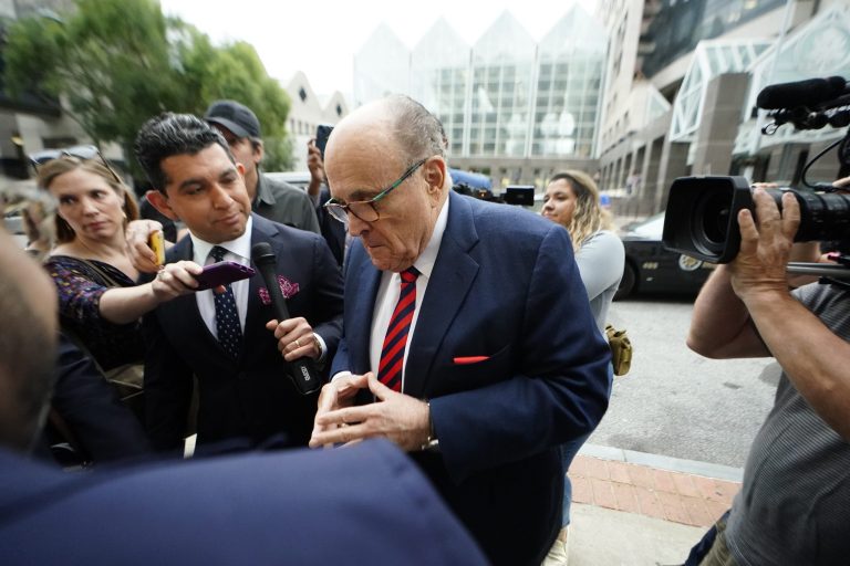 Rudy Giuliani arrives at the Fulton County Courthouse on Wednesday, Aug. 17, 2022, in Atlanta. A new, upcoming book from writer Andrew Kirtzman claims Riuliani was rejected by former President Donald Trump in serving as his Secretary of State. (AP Photo/John Bazemore)