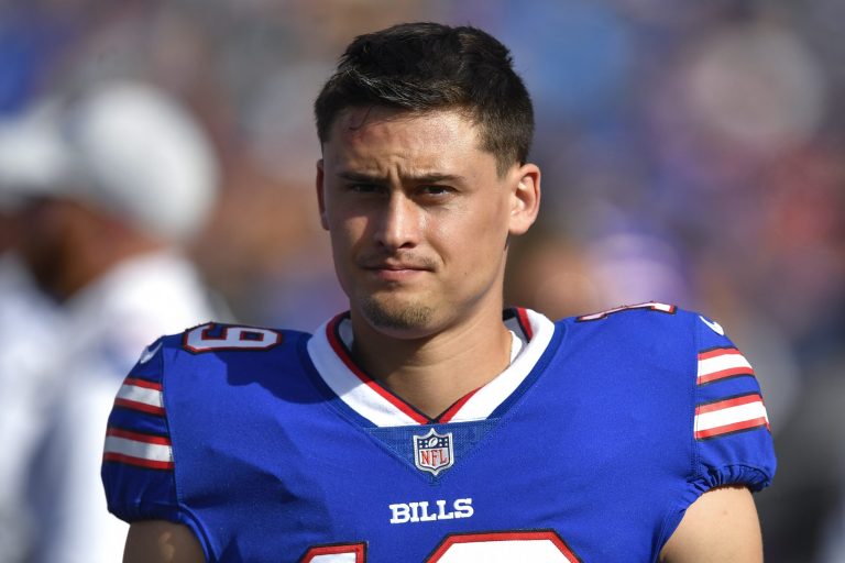 Buffalo Bills punter Matt Araiza, seen here on the sidelines during a preseason NFL game earlier this month, was cut from the team Sat., Aug. 27, two days after a lawsuit was filed alleging the player and two college teammates gang-raped a teenager last fall. 