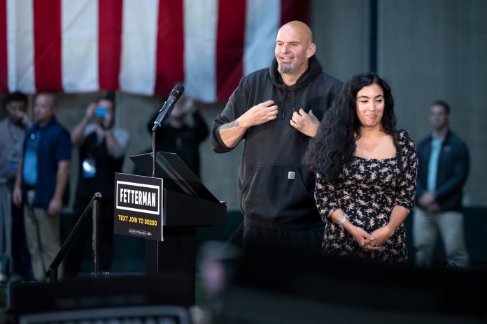 Pennsylvania Lt. Gov. and Democratic candidate for Senate John Fetterman takes the stage with his wife, Gisele.