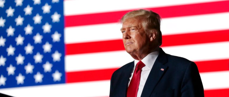 Former President Donald Trump listens to applause from the crowd as he steps up to the podium at a rally Friday, Sept. 23, 2022, in Wilmington, North Carolina. Trump claimed on Truth Social that recent claims that he wanted to fire both Ivanka Trump and Jared Kushner during his time in the White House are false. (AP Photo/Chris Seward)