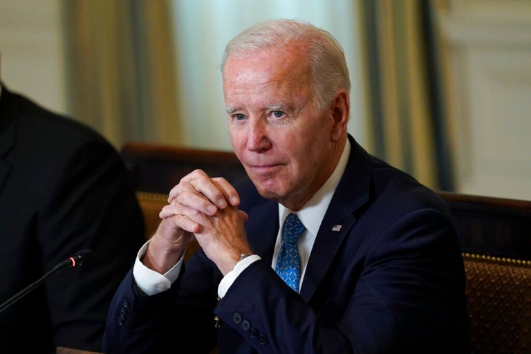 President Joe Biden waits for members of the press to leave after speaking at a meeting of the White House Competition Council in the State Dining Room of the White House in Washington, Monday, Sept. 26, 2022. 