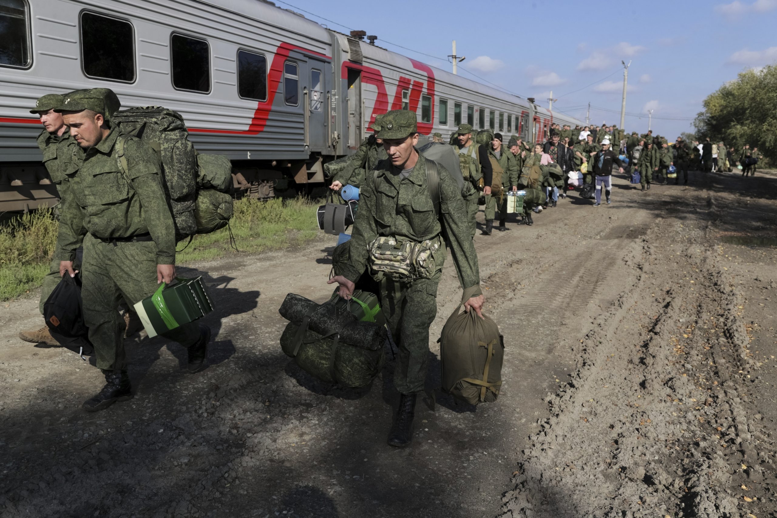 Russian troops pour into Belarus ‘by the trainload’