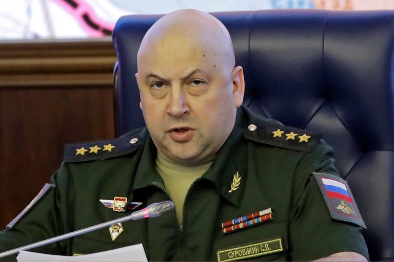 Col. Gen. Sergei Surovikin, commander of the Russian forces in Syria, speaks, with a map of Syria projected on the screen in the back, at a briefing in the Russian Defense Ministry in Moscow, Russia, Friday, June 9, 2017. Russia's Defense Ministry announced that air force chief, Gen. Sergei Surovikin, would be the commander of all Russian troops fighting in Ukraine. The statement marked the first official appointment of a single commander for the entire Russian force in Ukraine.