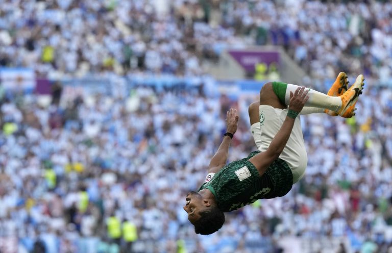 Saudi Arabia's Salem Al-Dawsari celebrates after scoring his side's second goal during the World Cup group C soccer match between Argentina and Saudi Arabia.