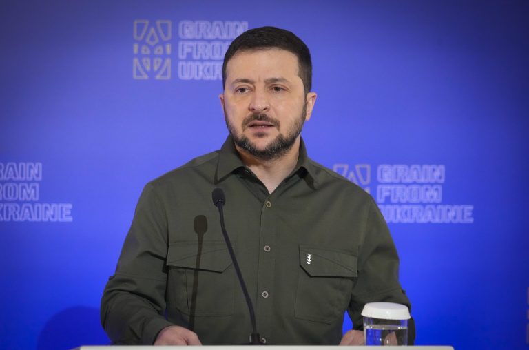 Ukrainian President Volodymyr Zelensky attend a news conference during 