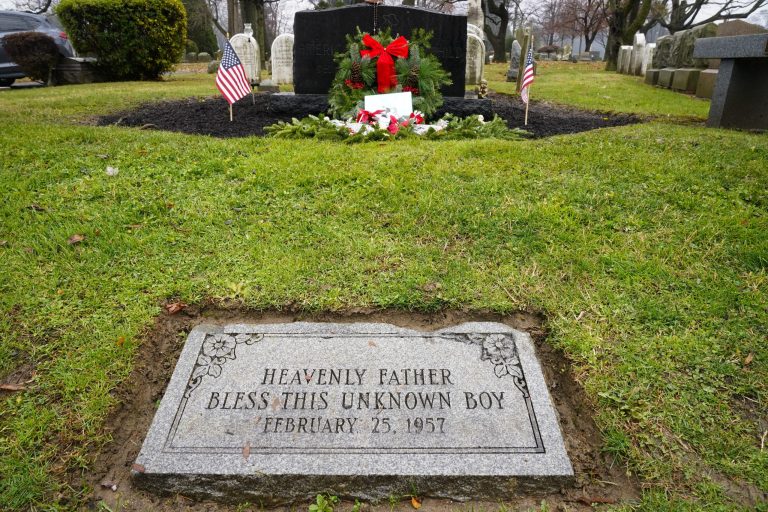The gravesite of a small boy whose battered body body was found abandoned in a cardboard box decades ago  is seen in Philadelphia, Wednesday, December 7, 2022. Police announced the identity of the boy in the box as Joseph Augustus Zarelli on Thursday, December 8, 2022. (AP Photo/Matt Rourke)